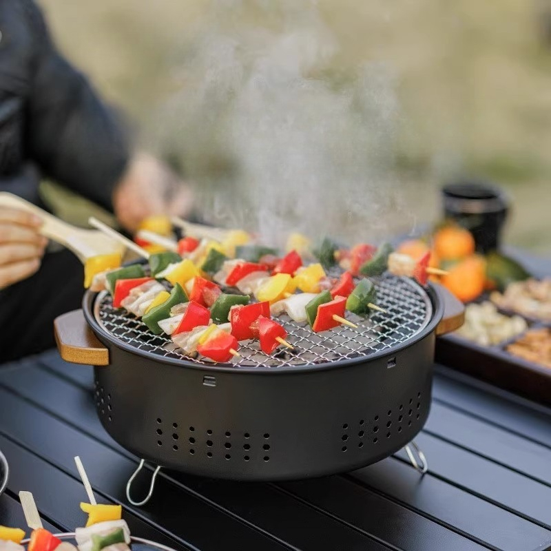 Campinguitrusting Buitenbarbec - Camping Cooking Range recensie en prijs